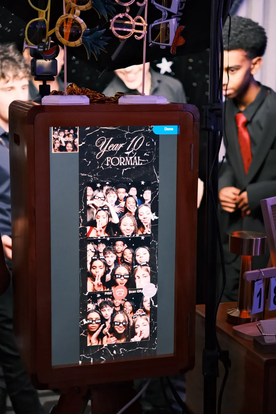 A Year 10 formal photo strip on the booth screen, ready to print